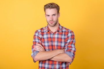 Being serious. Menswear shop. Macho man wearing checkered shirt. Fashion summer trends. Unshaven man skin care. Barbershop concept. Casual style. Masculinity concept. Man beauty model. Strict face