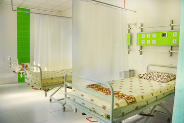 hospital ward with beds in hospital