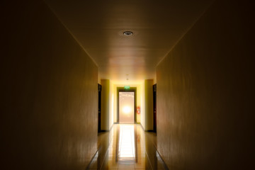 The exit door of the dark building