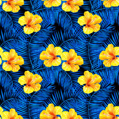Yellow hibiscus and blue palm leaves on a black background. Tropical watercolor seamless pattern. Design for wallpaper, rextile, fabric, packaging. © Ilona
