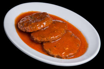 Cutlets in tomato sauce