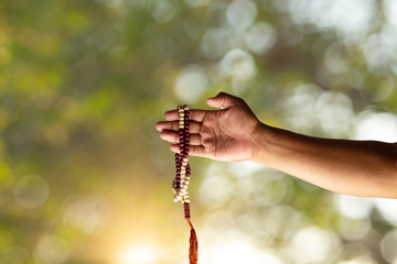 
praying hands Muslim men pray to worship with faith during the Ramadan,
concept: spirituality religion for hope to create inspiration for living happiness,
 meditation praise god for  forgiveness
