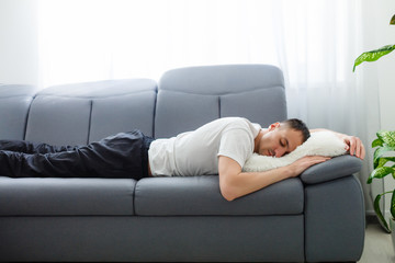 Coronavirus Quarantine Lifestyle. Man Sleeping Lying In Bed At Home During Pandemic Self-Isolation....