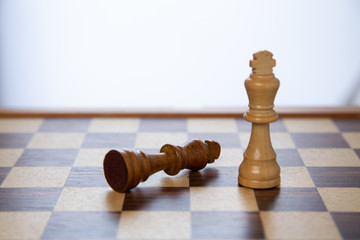 Chess placed on a wooden table, concept: of business strategy and tactic battle, symbol competition game success play victory war leader, Planning a business teamwork battle strategy for success