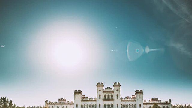 Kosava, Belarus. Summer Sun Shine Above Kosava Castle. It Is A Ruined Castellated Palace In Gothic Revival Style. Puslowski Palace Castle. Landmark And Heritage.