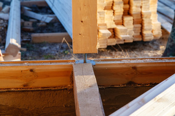 Iron screw support for a wooden house.