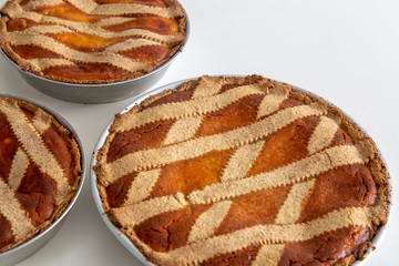 Preparation the typical Neapolitan Easter cake, Pastiera, typical homemade dessert, with eggs, flour, sugar and vanilla, wheat, orange essence