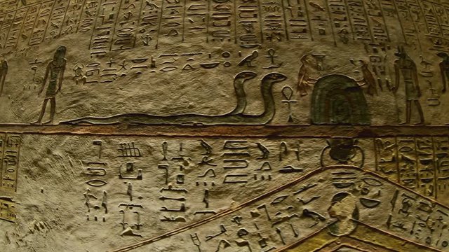 ancient color egypt images and hieroglyphics on wall of tomb