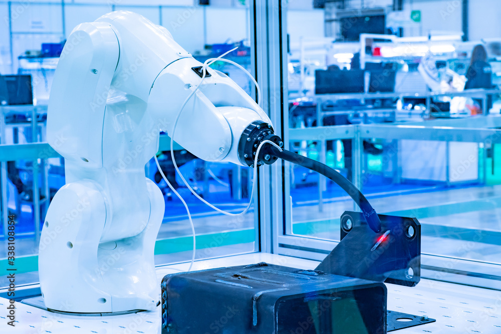 Poster the welding robot manipulator. welding of metal parts in automatic mode. robot for welding in produc