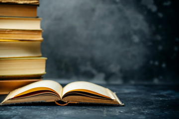 Book study educated. Library and dictionary background. Studying students at universities and colleges, schoolchildren at school and home distance learning concept