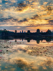 Naklejka premium Siem Reap, Cambodia, December 30, 2019: Angkor Wat temple sunrise