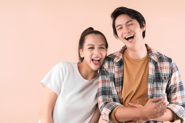 happiness freshness asian couple attractive  male and female casual dress laugh smile with cheerful and enthusiasm together friendship relationship portrait with color isolate background
