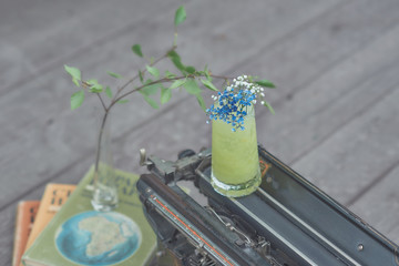 alcoholic cocktail with fruits on an old wooden table