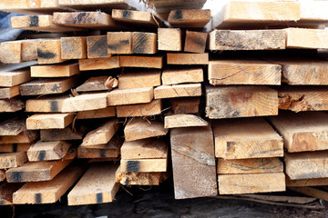 stacked lumber from the end