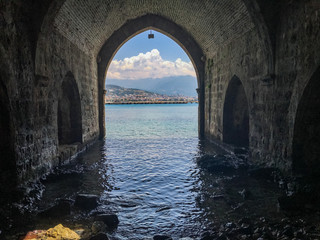 Old arch over the sea