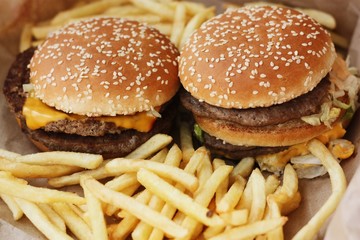 Beef burgers and French fries in the cafe 
