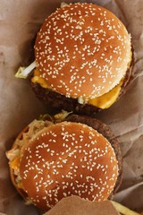 Delicious beef burgers with cheese and ketchup 