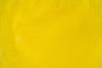 A beautiful Yellow paint texture on wall, background - Image. Color paint strokes.