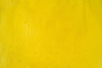 A beautiful Yellow paint texture on wall, background - Image. Color paint strokes.