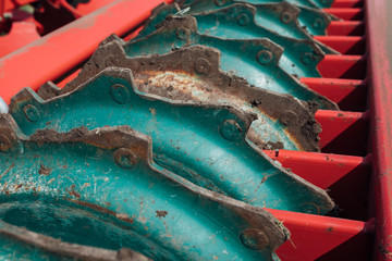 Fototapeta premium mechanical device for cultivating agricultural land arable land plow in the field in summer