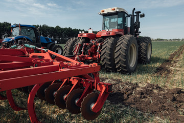 mechanical device for cultivating agricultural land arable land plow in the field in summer