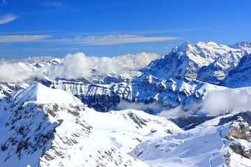 Fototapeta na wymiar View of Alps from Schilthorn. Bernese Alps of Switzerland, Europe.