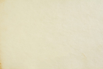 Old white beige sheet of drawing paper with rough surface texture background. Blank vintage paper with copy space for text.