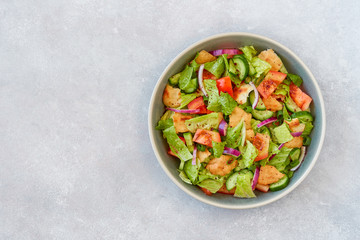 Traditional arabic lebanese fattoush salad . Top view with copy space
