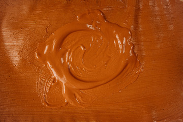 A beautiful Brown paint texture on wall, background - Image. Color paint strokes.