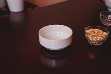 white porcelain bowl and oatmeal on a transparent bowl.