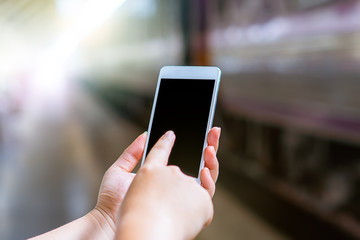 Young smart solo woman tourist travel use mobile phone application plan search information organize trip book reserve transportation bus train hotel flight by internet cashless credit card technology