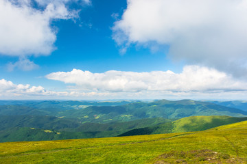 alpine scenery of carpathian mountains. stunning views on a windy summer day. clouds on the sky. ridges and valleys in the distance