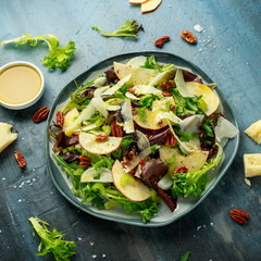 Vegetarian Fennel and apple salad with pecan nuts and Pecorino romano cheese shavings