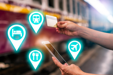 Young smart solo woman tourist travel use mobile phone application plan search information organize...