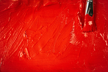 A beautiful Red paint texture on wall, background - Image. Color paint strokes.