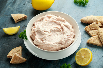 Taramasalata dip made with fish roe in white bowl