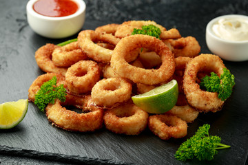 Oven baked breaded calamari rings served with lime wedges, sweet chilli sauce and mayonnaise