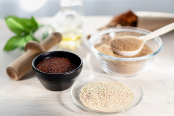 healthy diet set - quinoa seeds, fiber, olive oil and herbs.