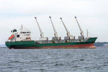 trawler with cranes on deck at sea