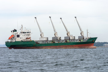 Fototapeta premium trawler with cranes on deck at sea