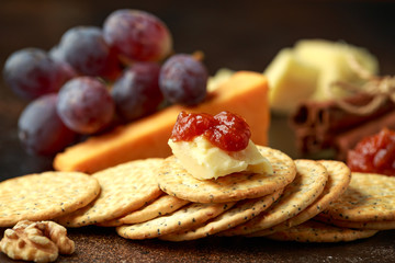 stack of crackers with apple chutney and other snacks
