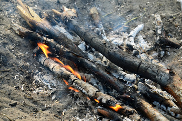 A fire with a small flame of fire