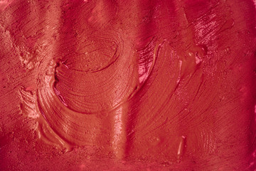 A beautiful Crimson paint texture on wall, background - Image. Color paint strokes.