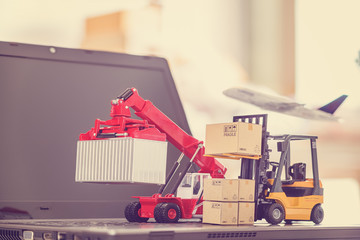 Logistics, supply chain / delivery service concept : Fork-lift truck, boxes, reach stacker and...