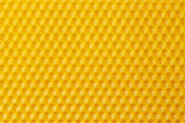 Beeswax. Wax base for honey bee rebuilding. Honeycomb. Natural honeycomb bee background.