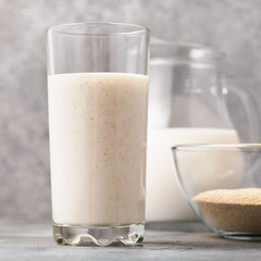 A glass of fresh kefir with oat bran, close-up. The concept of healthy nutrition for the human digestive system