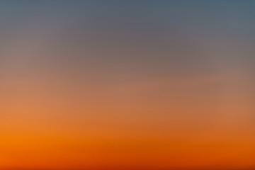 Sky gradient from blue to orange sunset