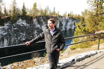 Man in Mountain park Ruskeala is tourist complex located in Sortavala region of Republic of Karelia...