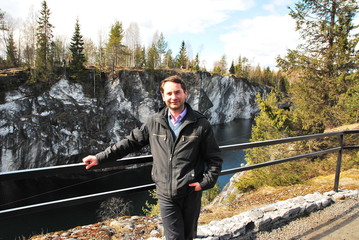Man in Mountain park Ruskeala is tourist complex located in Sortavala region of Republic of Karelia...