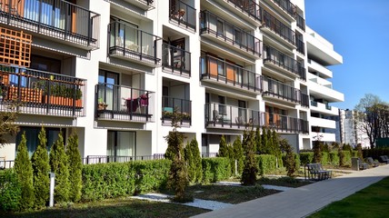 Contemporary residential building exterior in the daylight. Modern apartment buildings on a sunny...
